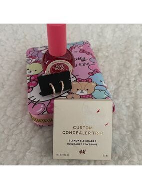 Hello Kitty Wallet with gold tone earrings and more